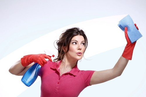 Cleaning a fabric sofa to remove stains and dust in West Hendon